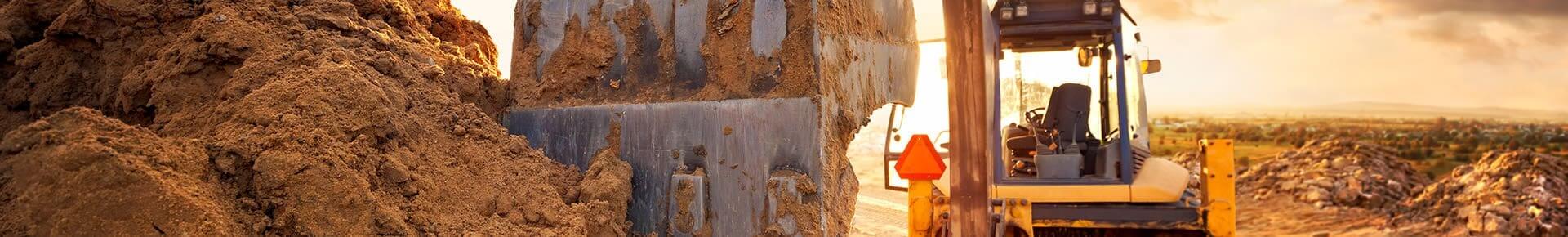 Yellow Excavator on Construction site