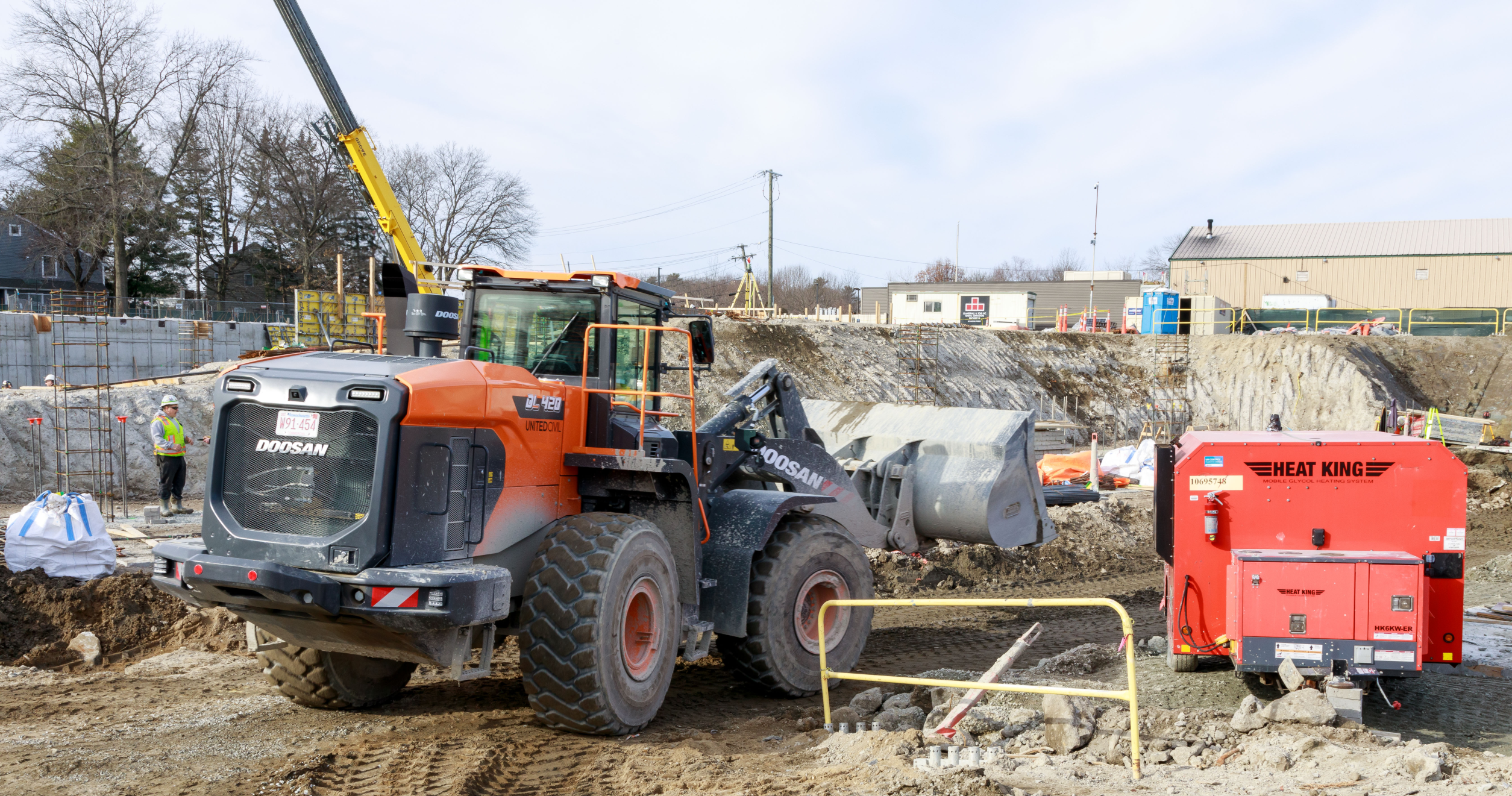 Jobsite with red loader